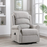 A grey fabric electric riser recliner chair with a steel frame and dual motor mechanism, positioned in a room with a light interior.